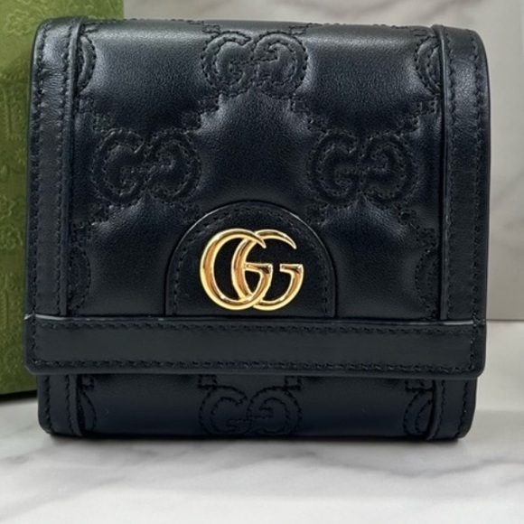 Gucci Handbags - GUCCI Matelasse GG compact wallet LIKE NEW